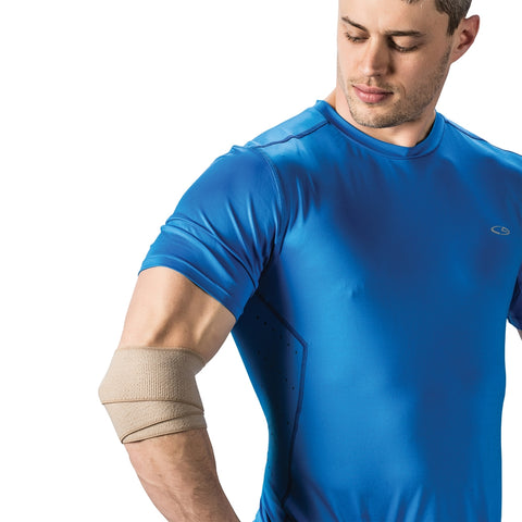 Image of nelmed multi-use wrap, wrapped around man's elbow, beige color